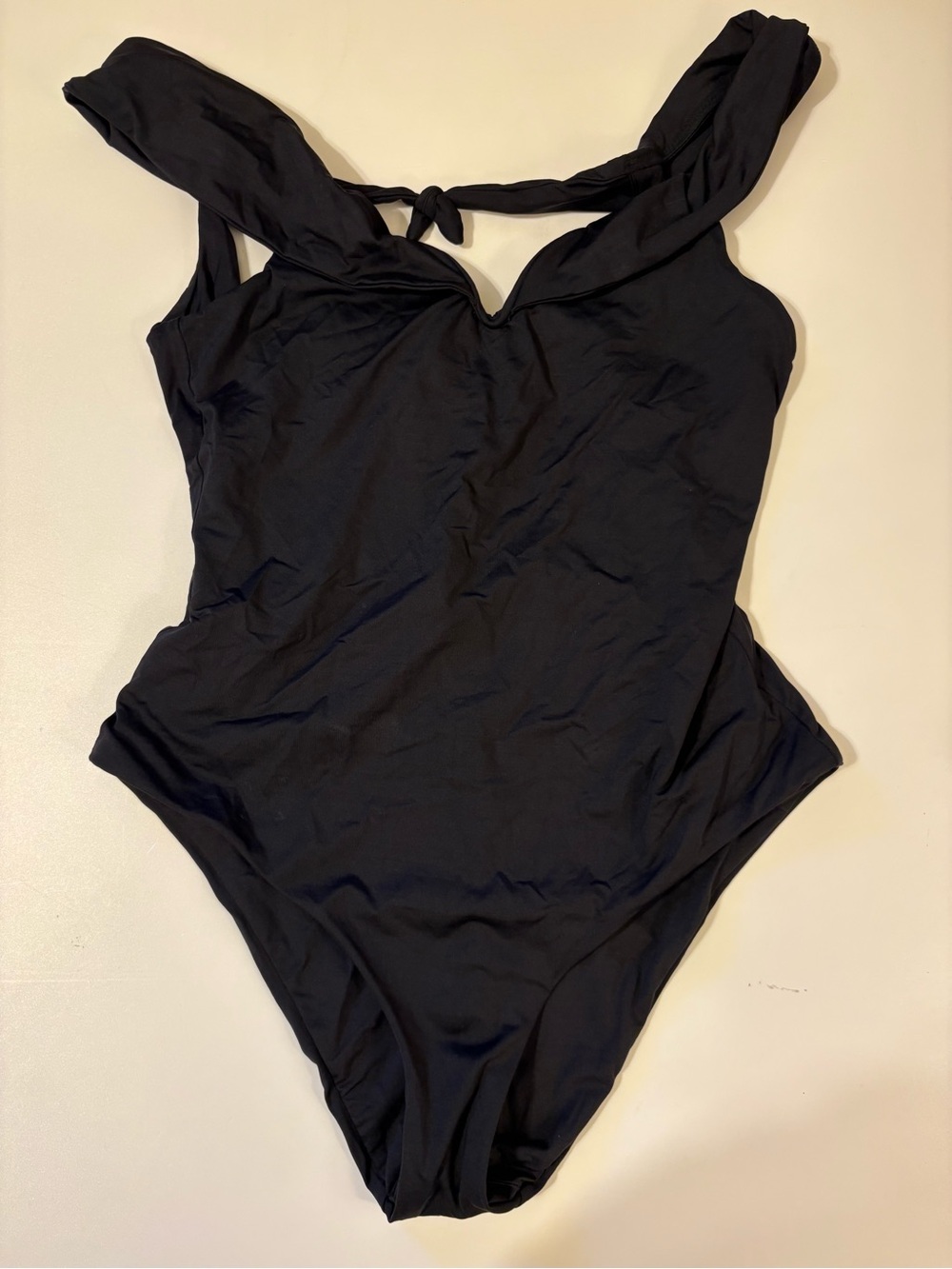 BECCA Black One-Piece Swimsuit with Gold Logo Tag